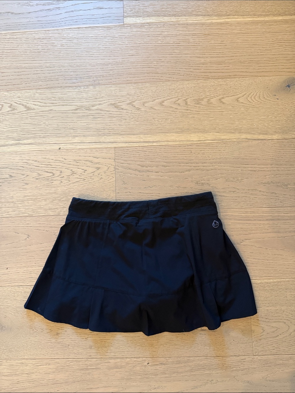 Tasc Black Tennis Skort with Subtle Logo